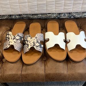 Two pairs of slide on sandals